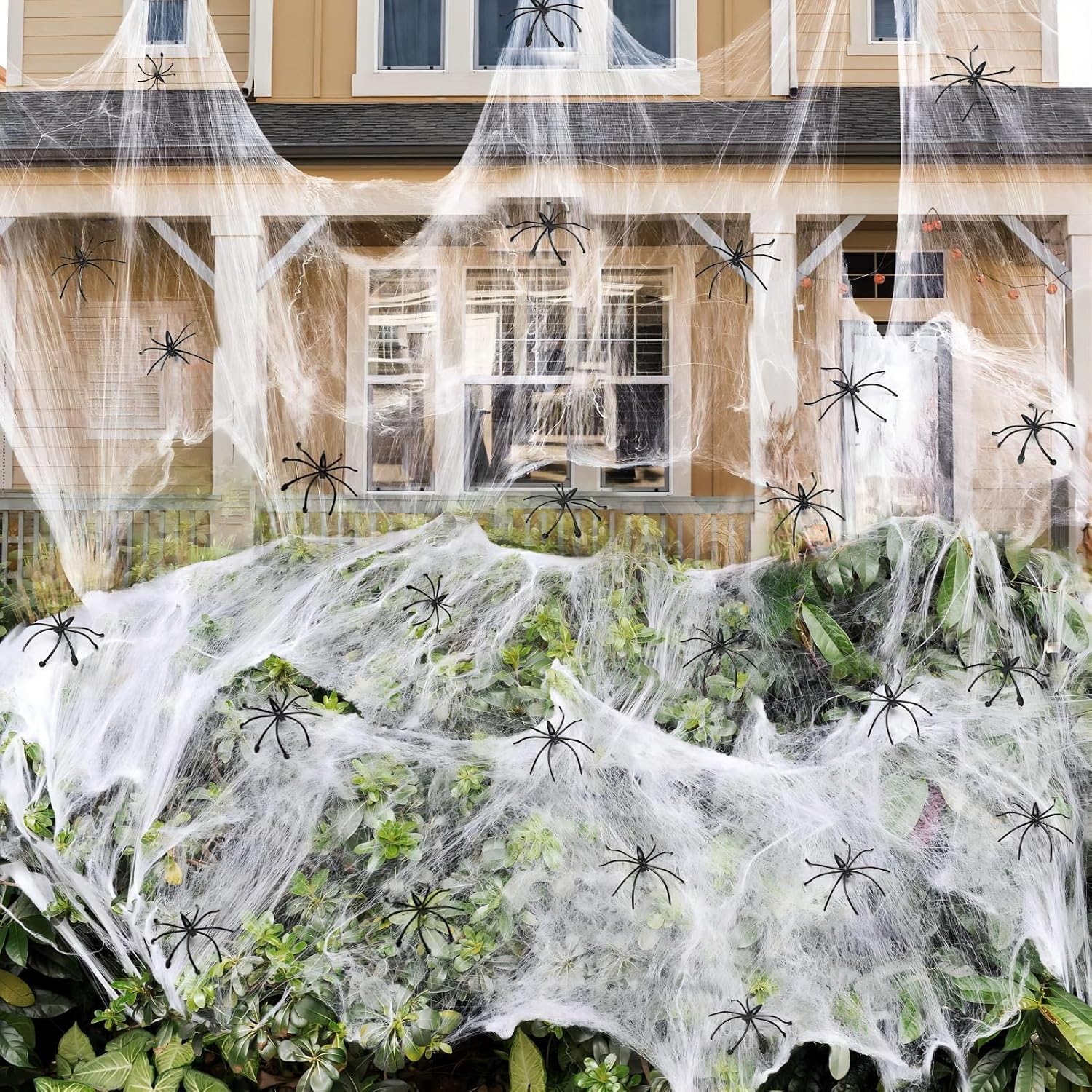 Halloween spiders and stretchy cobweb decorations